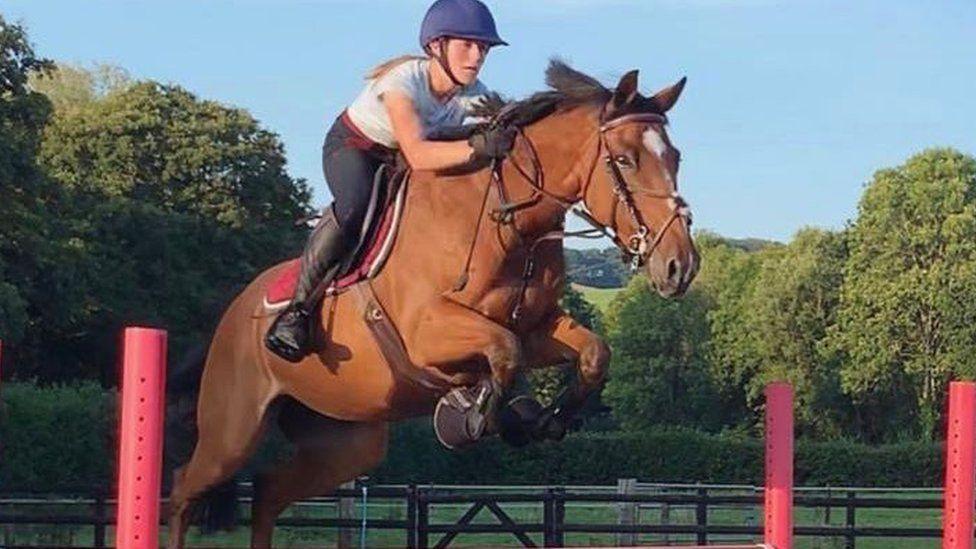 Brodie Morgan on a horse showjumping