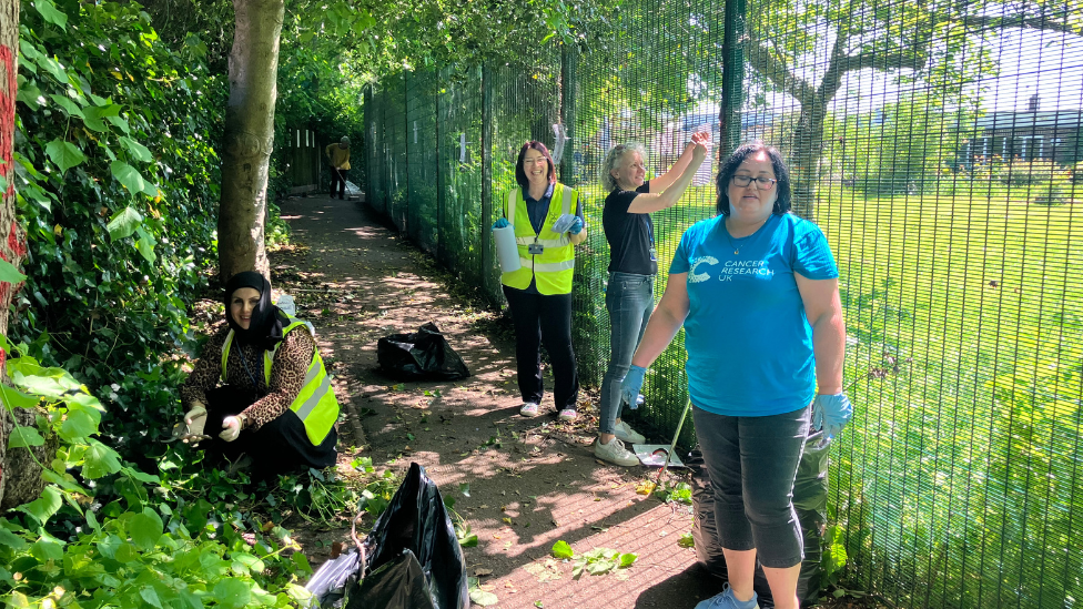 Volunteers tidying up the area