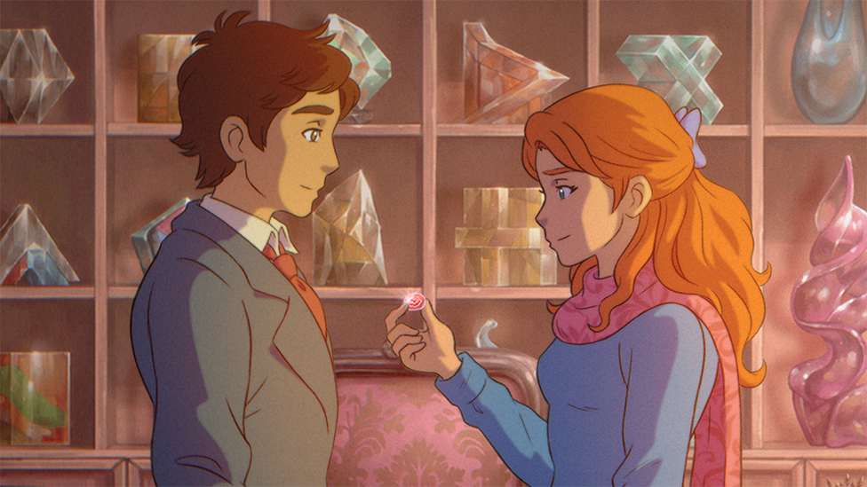 A hand-drawn still from animated movie The Glassworker. It shows a young man dressed in a suit with red tie and a young woman with long red hair facing each other. She's holding up a small pink piece of glass engraved with an intricate pattern that reflects a spark of light at the viewer. Behind them is a shelving unit filled with ornated pieces of glasswork.