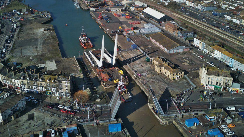 The bascule span of the Gull Wing Bridge arriving at Lake Lothing in Lowestoft