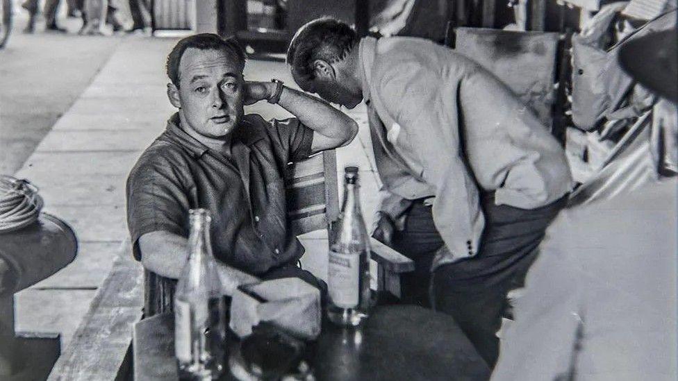 Donald Campbell sitting down at a cafe