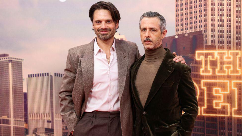 Cast members Sebastian Stan and Jeremy Strong pose during a presentation for the film The Apprentice at the BFI London Film Festival 