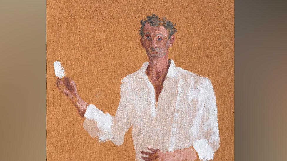 Self-portrait by Patrick Procktor wearing a white shirt and holding up a paintbrush dipped in white paint against an orange background, painted 1991