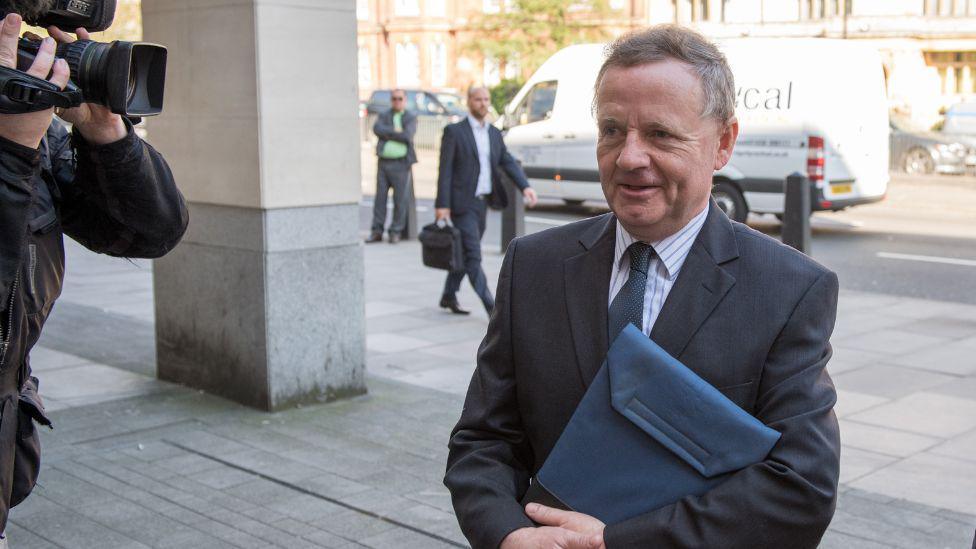 Andrew Hill outside a court in London