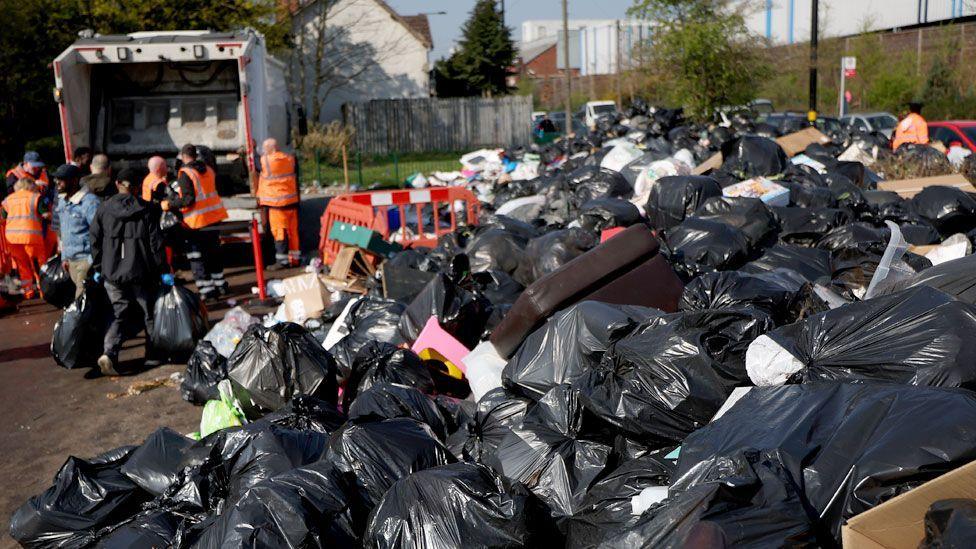 Rubbish is piled high at a drop off point at a community centre in Birmingham, Britain, on 3 April 2025.