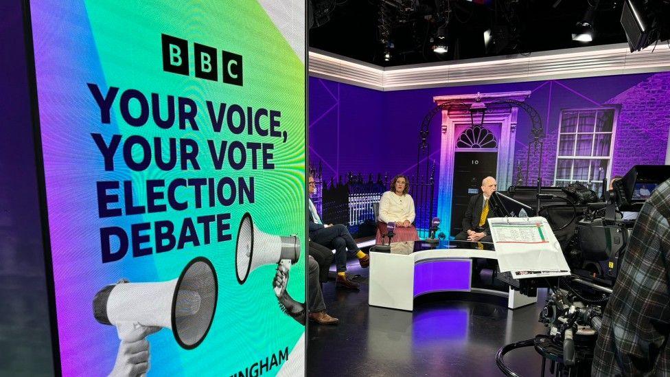 Another view from behind a BBC camera of the studio displaying the BBC Nottingham Your Voice, Your Vote debate