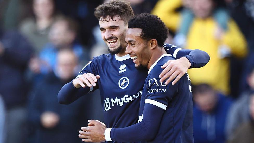 Mihailo Ivanovic celebrates with Femi Azeez