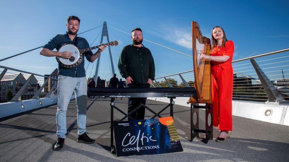 Ciaran Ryan, Michael Biggins and Ciorstaidh Beaton launched the 2025 Celtic Connections festival while standing on the Govan to Partick bridge