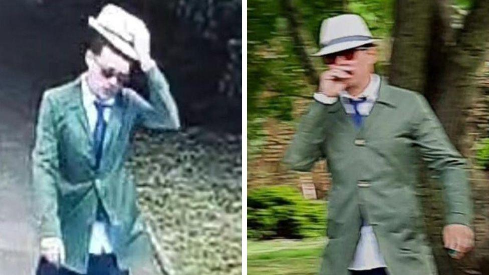 A man in a green jacket, blue tie and white shirt with blue trousers and brown shows. He is shown in two images side by side and is wearing a trilby-style hat with a blue band