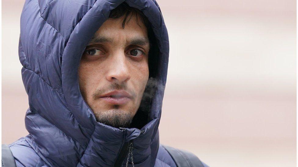 A photo of the defendant