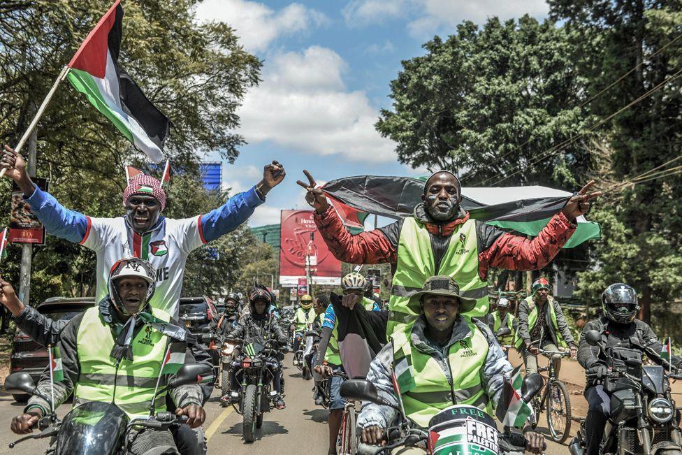 Motorbikes and bicycles parade with Palestinian flags during a motorcade in solidarity with Gaza, in Nairobi, Kenya - Sunday 24 August 2025. 
