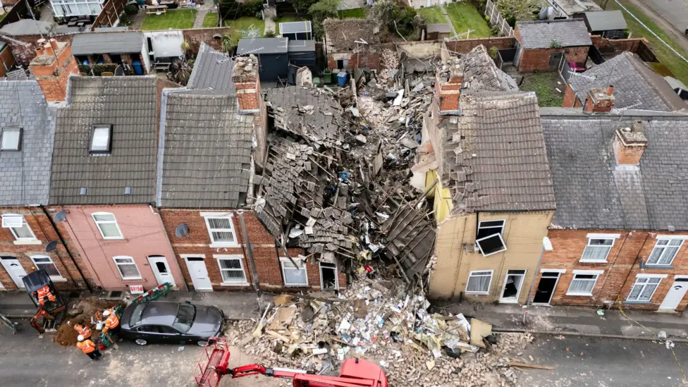 John Street Worksop aerial view with the debris of a house strewn across a street