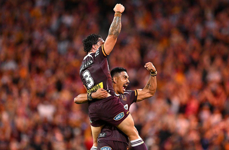 Kotoni Staggs and Deine Mariner of the Broncos celebrate victory during the NRL Preliminary Final match against the Penrith Panthers at Suncorp Stadium in Brisbane. Photo by Albert Perez