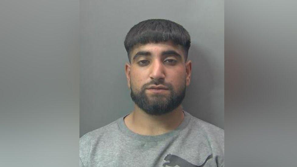 Police mugshot of Mohammed Mehtab