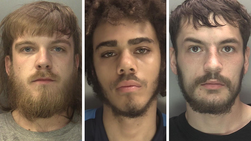 A composite image of three men's mugshots. The man on the left has long brown hair and a beard, the man in the middle has long dark curly hair and a beard, the man on the right has short brown hair and a beard.