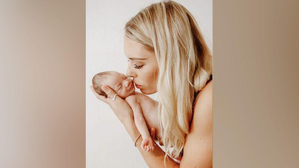 Gracie, who was born 10 weeks early, and her mother Mel Gray