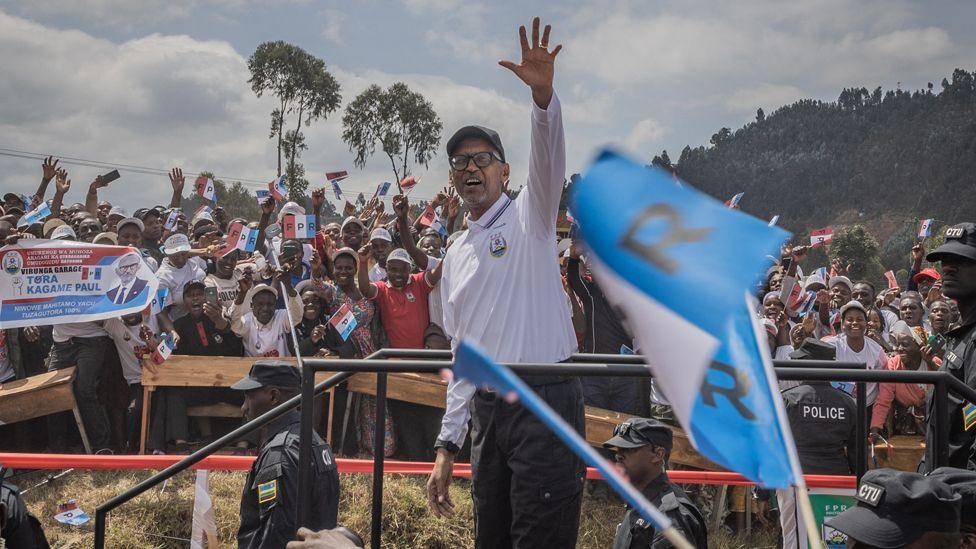 Rwandan President Paul Kagame (C) waves at supporters during a Rwanda Patriotic Front (FPR) kick-off rally, in Musanze on June 22, 2024