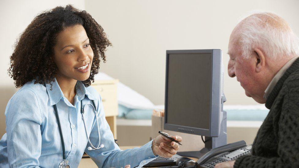 Patient chatting with their family doctor