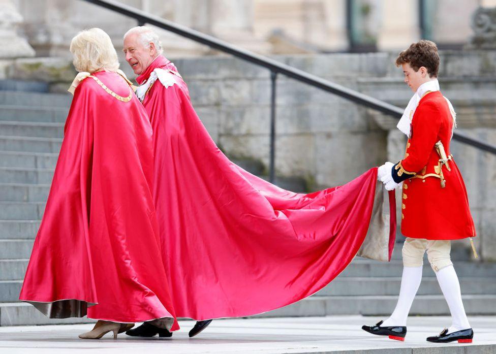 Queen Camilla and King Charles III, accompanied by his Page of Honour Lord Oliver Cholmondeley, attend a service of dedication for the Order of The British Empire at St Paul's Cathedral on May 15, 2024 in London, England.