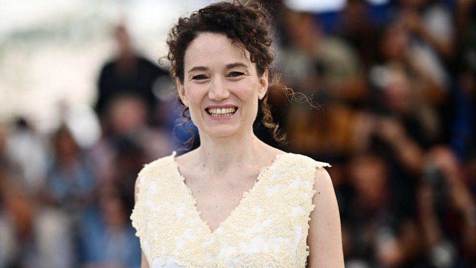 French director Coralie Fargeat poses during a photocall for the film "The Substance" at the 77th edition of the Cannes Film Festival in Cannes, southern France, on May 20, 2024