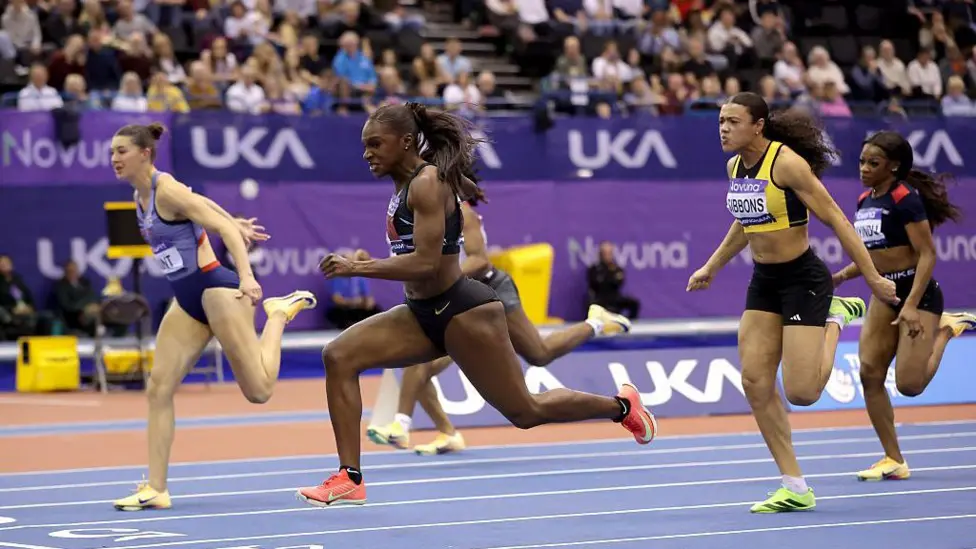 Dina Asher-Smith crosses the finish line in the final of the women's 60m at the UK Athletics Indoor Championships ahead of Amy Hunt and Aleeya Sibbons