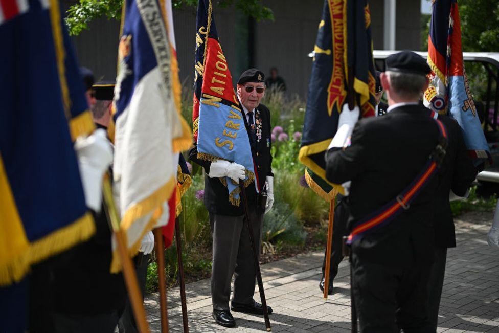 Standard-bearers prepare to take part in an annual service to remember the Normandy Landings at the National Memorial Arboretum in Stafford, central England on June 6, 2024.