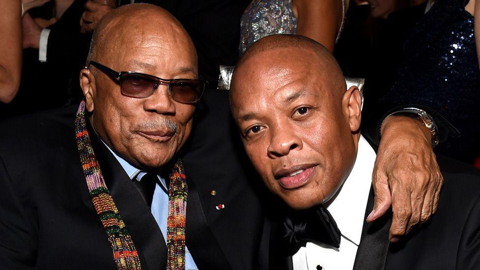 Quincy Jones with an arm around Dr Dre in 2018