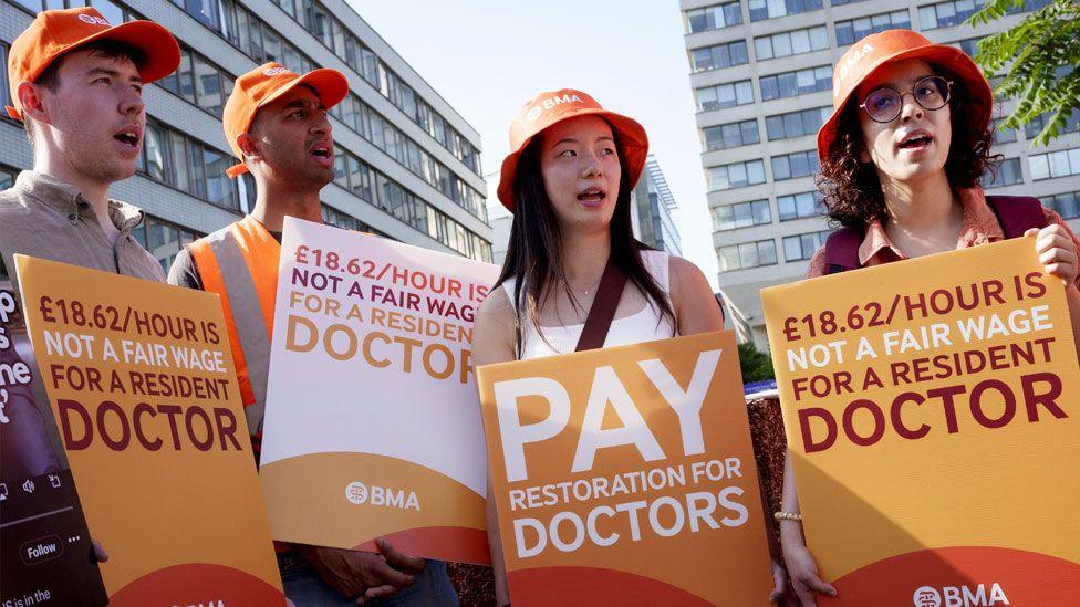 Striking resident doctors with the BMA British Medical Association union, stage their first day of industrial action outside St Thomas' Hospital on 25th July 2025, in London.