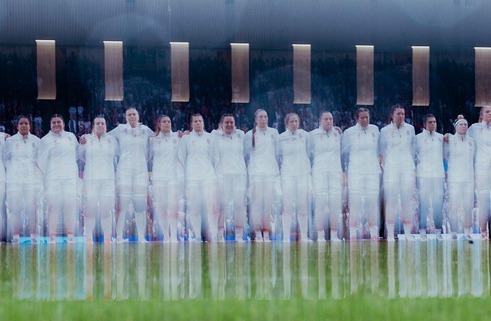 England players line up for the anthems before the Women's Rugby World Cup semi-final against France