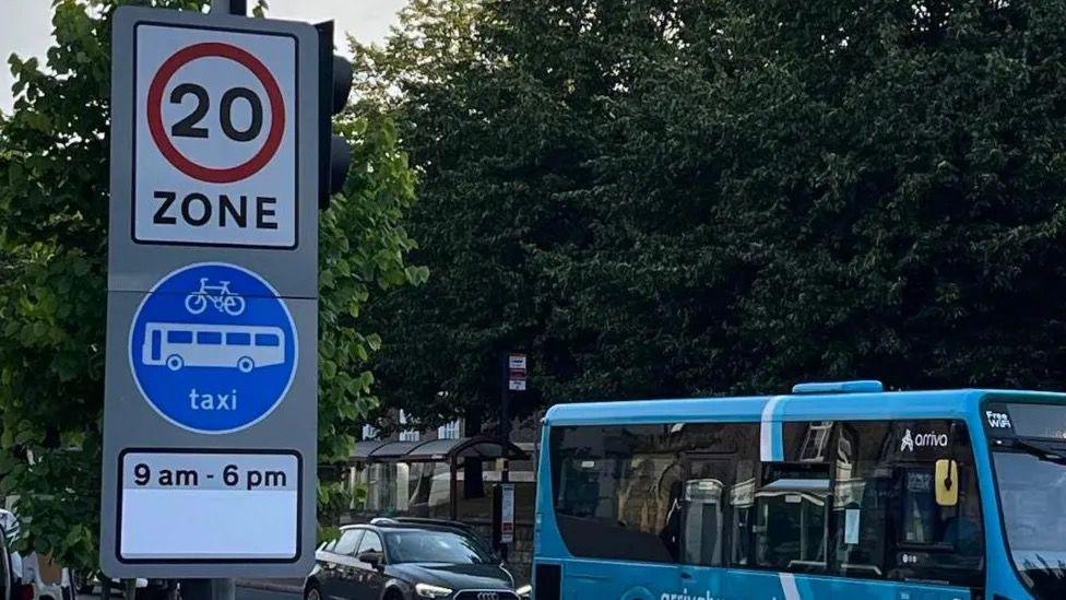 A road sign detailing restriction to road.