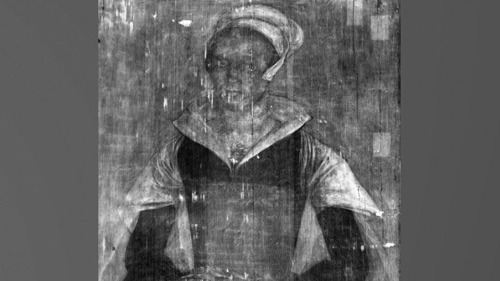 An infra-red image of a portrait of a Tudor woman believed to be Lady Jane Grey, from head to waist. It is greyed out to help expects discover changes made to it over the centuries. 
