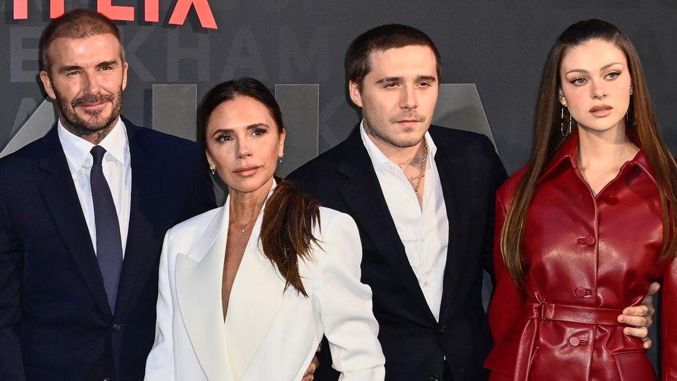 David and Victoria Beckham pose with Brooklyn Beckham and Nicola Peltz at the premiere of David’s self-titled 2023 Netflix documentary