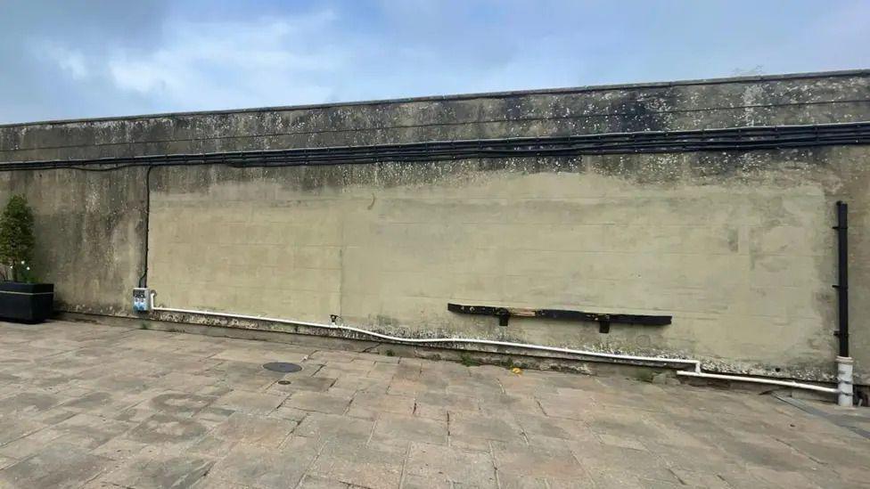 A blank wall in Tilgate Park in Crawley