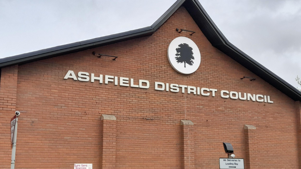 A red brick building with Ashfield District Council on the side