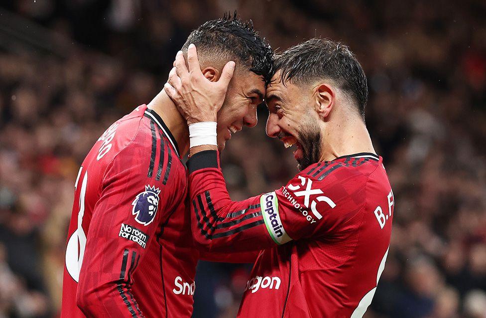 Casemiro celebrates scoring Manchester United's second goal with team-mate Bruno Fernandes during their 2-1 Premier League win against Chelsea at Old Trafford