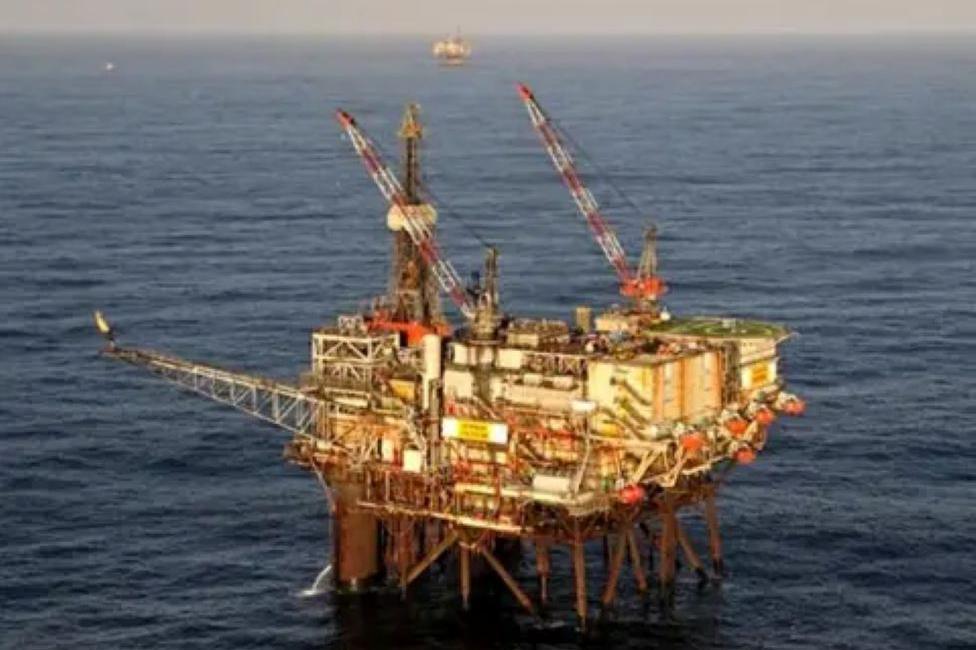 A picture of an offshore platform - Ninian Southern - in the North Sea, with the horizon in the distance.