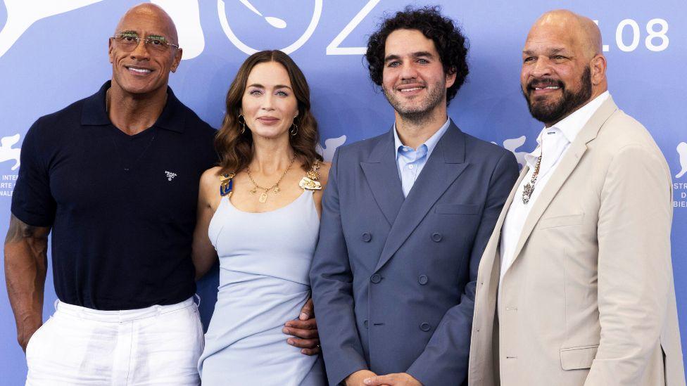 Dwayne Johnson, Emily Blunt, Benny Safie and Mark Kerr attend The Smashing Machine at this year's Venice film festival