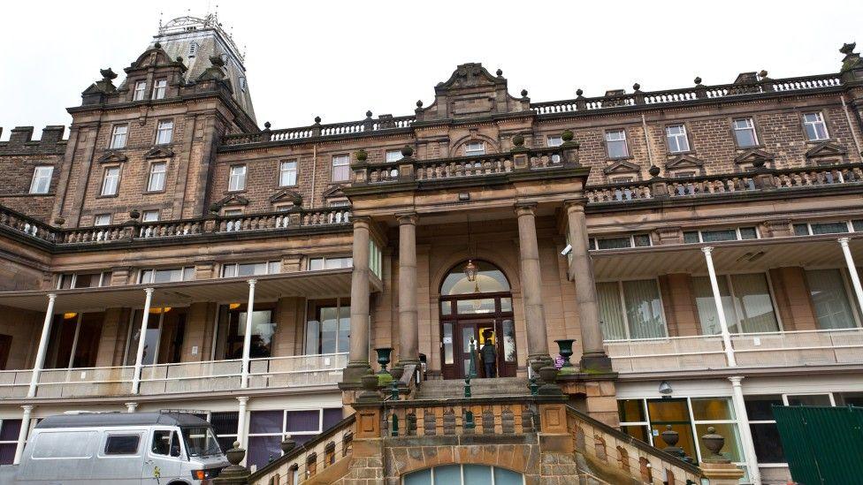 Derbyshire County Council headquarters, a large Victorian building with a columned entrance and ornate roofline