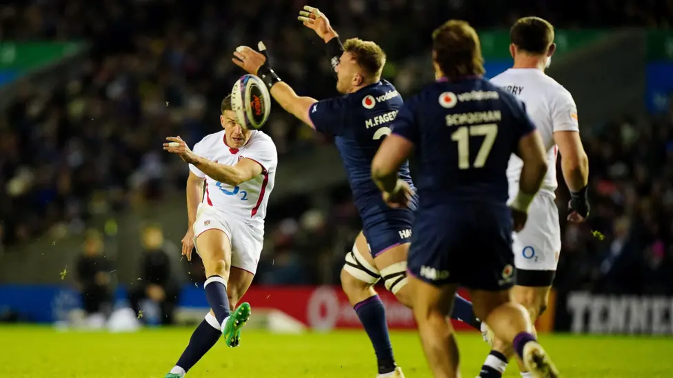 George Ford kick is charged down