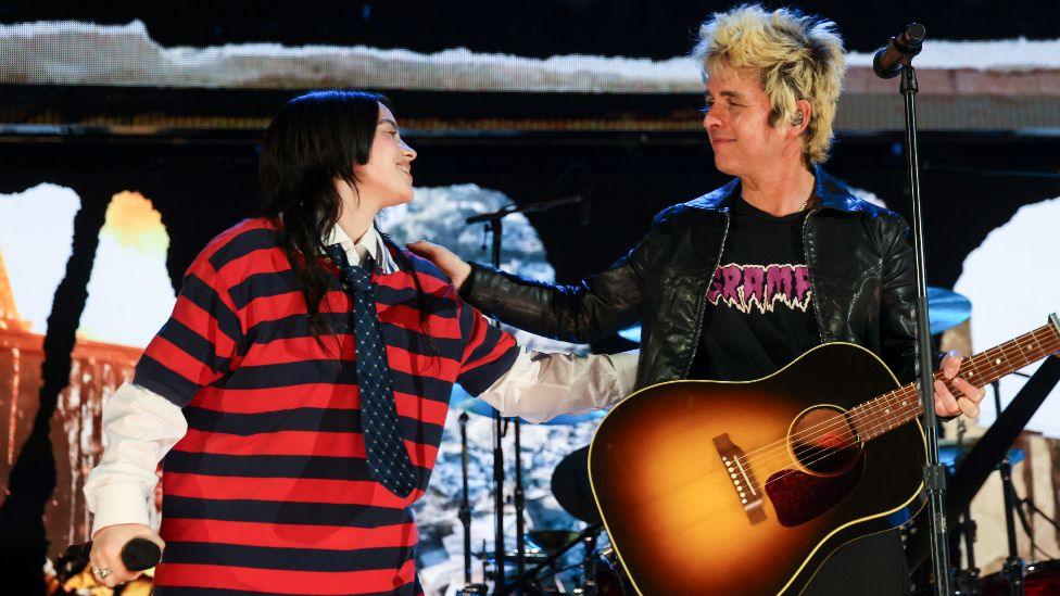 Billie Eilish performs onstage with Billie Joe Armstrong of Green Day during the FIREAID Benefit Concert for California Fire Relief at The Kia Forum on January 30, 2025 in Inglewood, California.