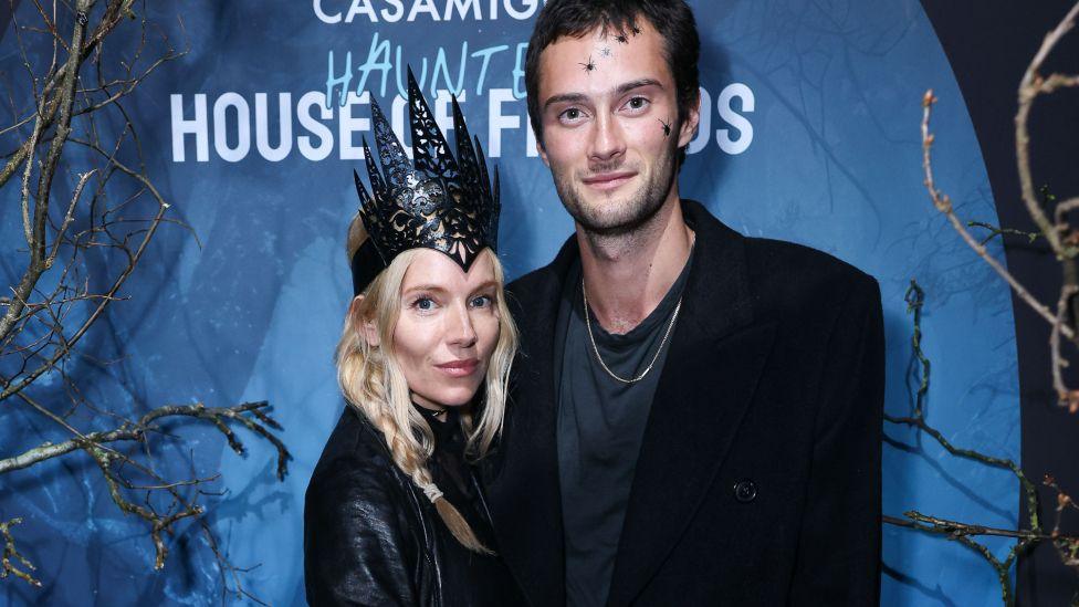 Sienna Miller and Oli Green attend Casamigos Tequila: The 2nd Haunted House of Friends' Halloween Party at Jack Solomons on October 31, 2024 in London, England