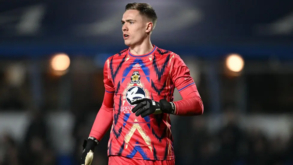 AFC Wimbledon sign goalkeeper Nathan Bishop from Sunderland for an undisclosed fee on a three year contract 