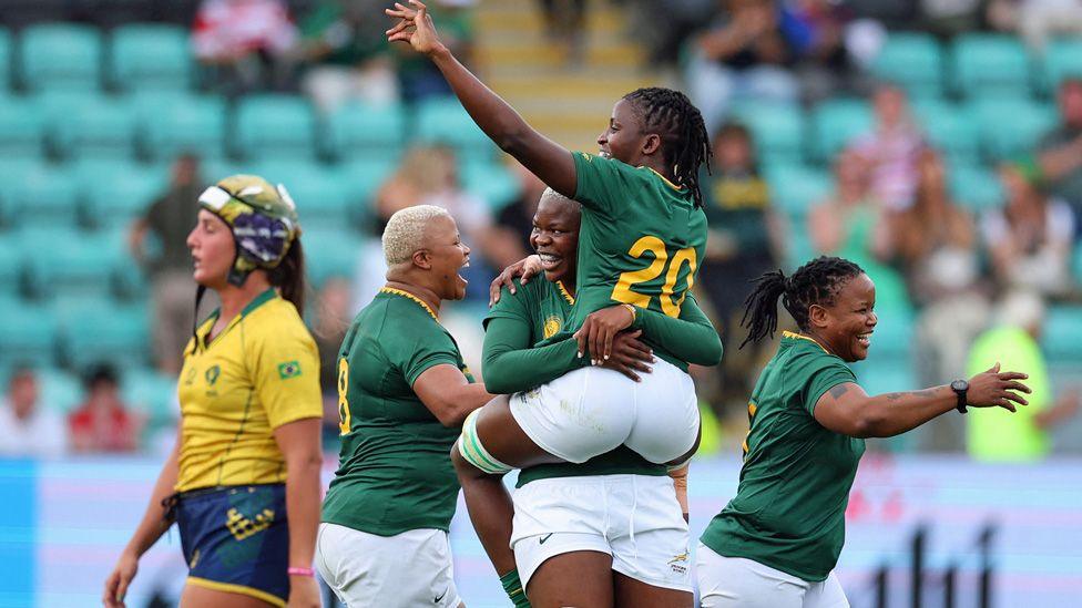 South Africa's Vainah Ubisi celebrates with Lerato Makua - in white shorts and green tops - at the end of a match in Northampton against Brazil - Sunday 24 August 2025.