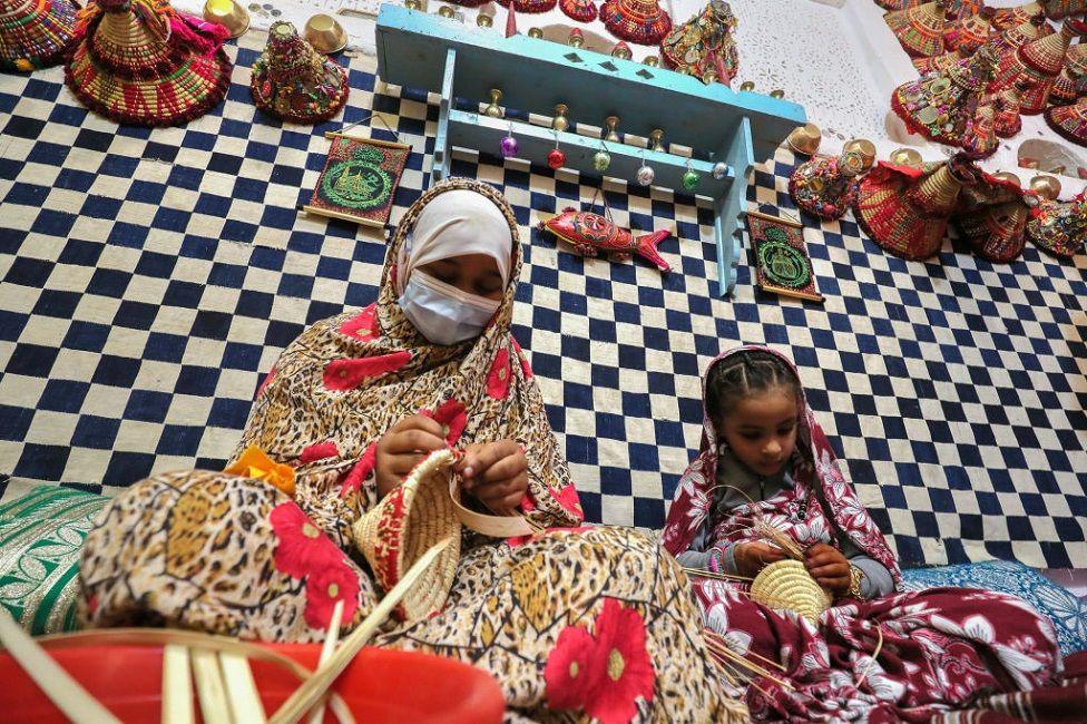 Participants practice traditional basketry during the Ghadames Festival.