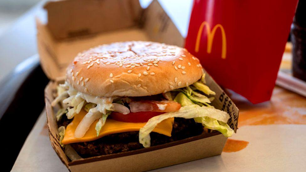 A double quarter pounder with cheese, fries, and a drink arranged at a McDonald's restaurant in El Sobrante, California, US, on Wednesday, Oct. 23, 2024. 