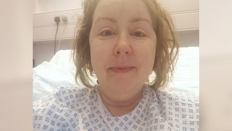 Niki Ridge at hospital undergoing treatment