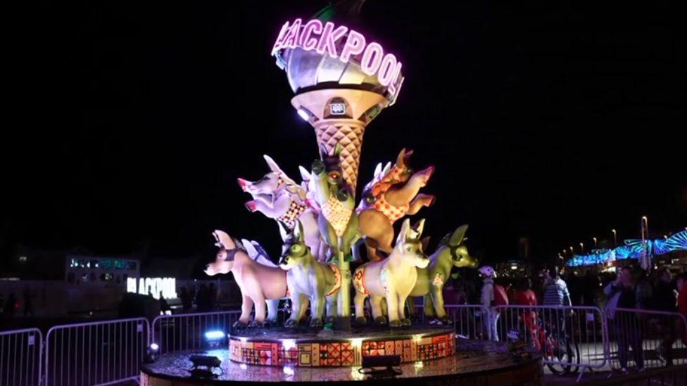 The tableau Llewelyn-Bowen designed this year - 12 donkeys dressed in 1970s-inspired swimwear parading on a 16ft high platform, beneath a giant ice cream topped with a disco ball