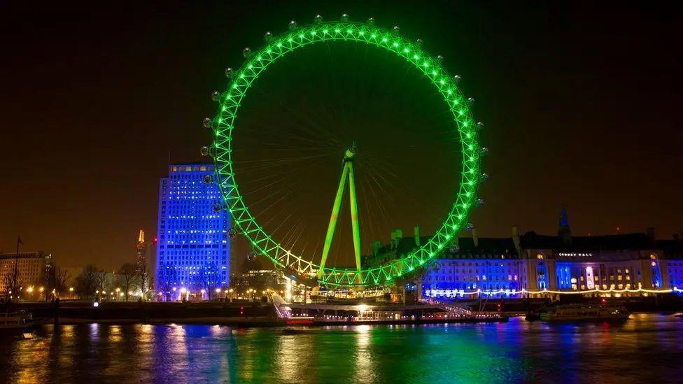 The London Eye is lit up green.