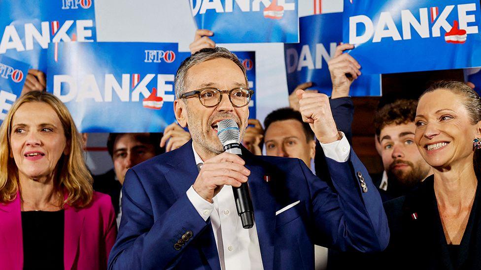 Chairman and top candidate of the Freedom Party of Austria (FPOe) Herbert Kickl (C) celebrates during FPOe election event after parliamentary elections in Vienna, Austria, 29 September 2024