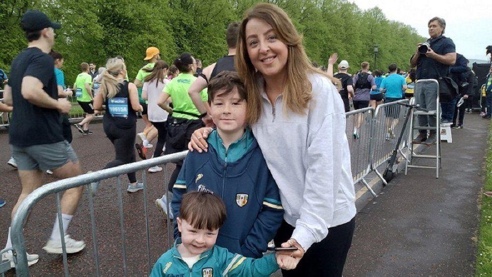 Grainne Conlan and sons Mason and Dillan cheering on dad Brendan 